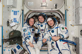 Russian cosmonaut Fyodor Yurchikhin (center), Expedition 37 commander; along with NASA astronaut Karen Nyberg and European Space Agency astronaut Luca Parmitano pose for a crew portrait while wearing their Russian Sokol spacesuits.
