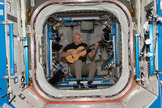 Italian astronaut Luca Parmitano of the European Space Agency plays guitar in weightlessness during his Expedition 37 mission on the International Space Station.