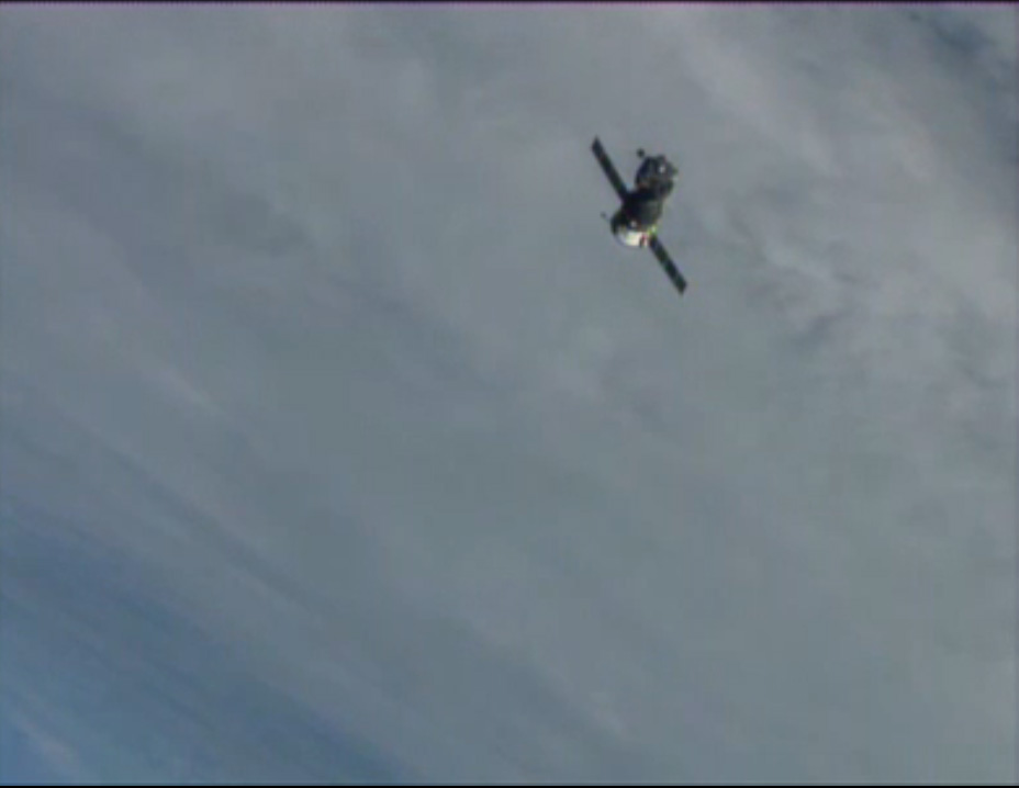 Soyuz Undocks with Olympic Torch and Expedition 37 Crew