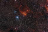 This wide-field image shows the patch of sky around the star cluster NGC 3572 and its associated gas clouds. Image released Nov. 13, 2013.