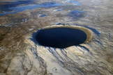 Caption: Pingaluit crater in Canada is a geologically young impact crater with a lake.