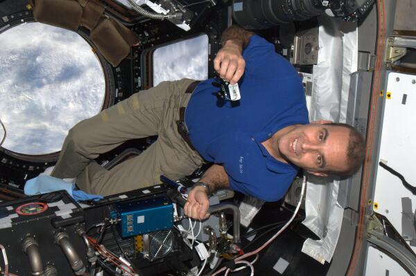 Rick Mastracchio on ISS: Travel Bug TB5JJN1’s First Appearance