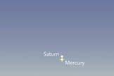 Where to look for Comet ISON low in early dawn on the morning of November 26th. Mercury and Saturn will be much brighter; start with them to find the spot to examine for the comet with binoculars. (The comet symbol is exaggerated.) For scale, this scene is about twice as wide as your fist held at arm's length.