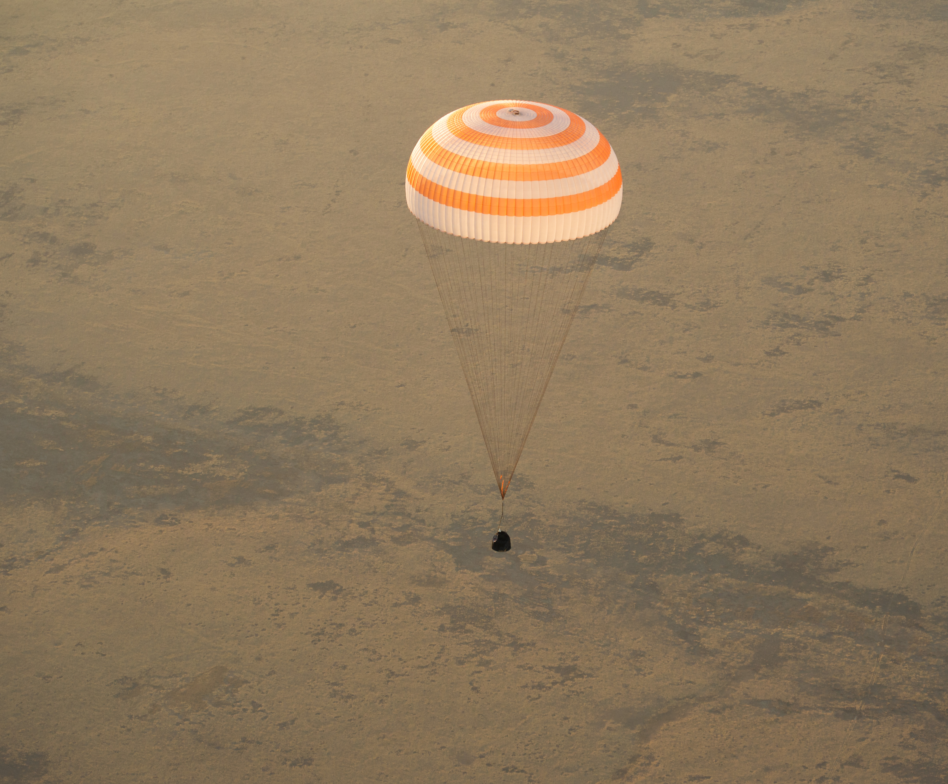 Olympic Torch Back on Earth: Soyuz Spacecraft Descending
