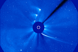 This time-lapse image shows Comet ISON approaching and leaving during its slingshot around the sun – represented by the white circle -- on Nov. 28, 2013. The ISON images clearly outline the curve of the comet's orbit path. The images were captured by ESA/NASA's SOHO mission.