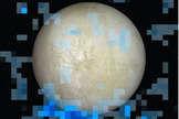 A south polar water vapor plume on Europa is shown in blue in this Hubble Space Telescope data image, which is superimposed on a visible light image of the Jupiter moon's leading hemisphere. Image released Dec. 12, 2013.