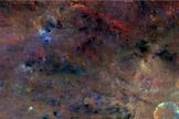 The northwest region of Vesta's crater Sextilia (at the bottom right of this image) reveals material likely carried in by an impact (black), as well as material that was probably created by melting (red).