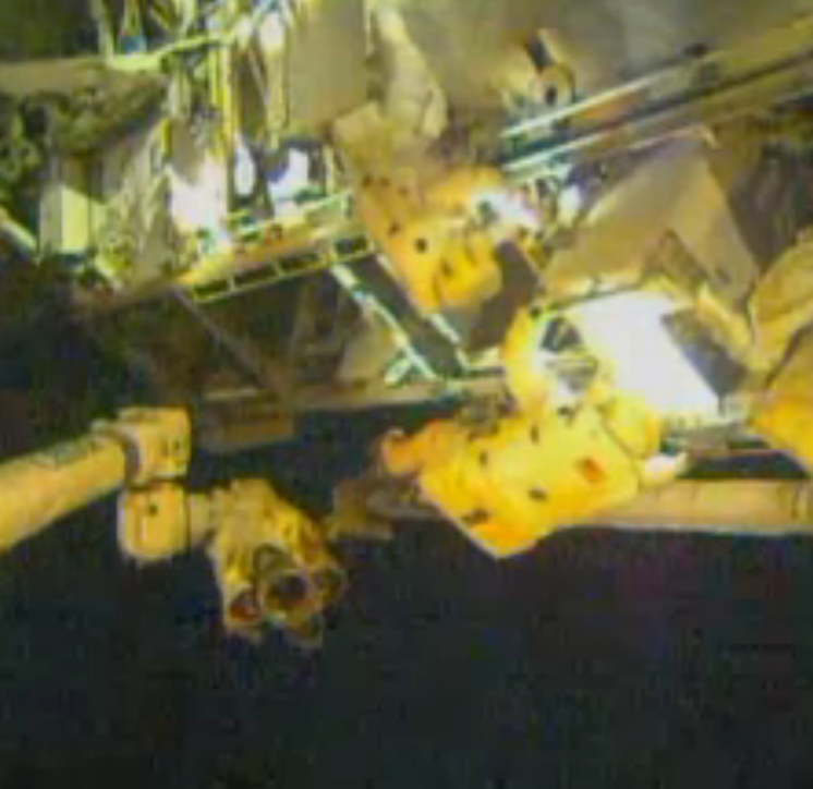 Astronauts Remove Pump from Space Station