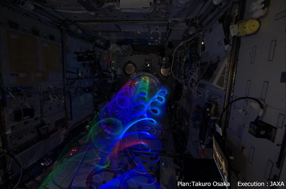 Astronaut Koichi Wakata tweeted this photo of the "Spiral Top" from aboard the International Space Station on Jan. 6, 2014. The toy uses LED lights to make art in zero-g conditions.