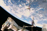 Orbital Sciences' Cygnus commercial cargo ship is on its final approach to the International Space Station before being captured by a robotic arm on Jan. 12, 2014. The spacecraft is carrying 2,780 pounds of supplies to the station.