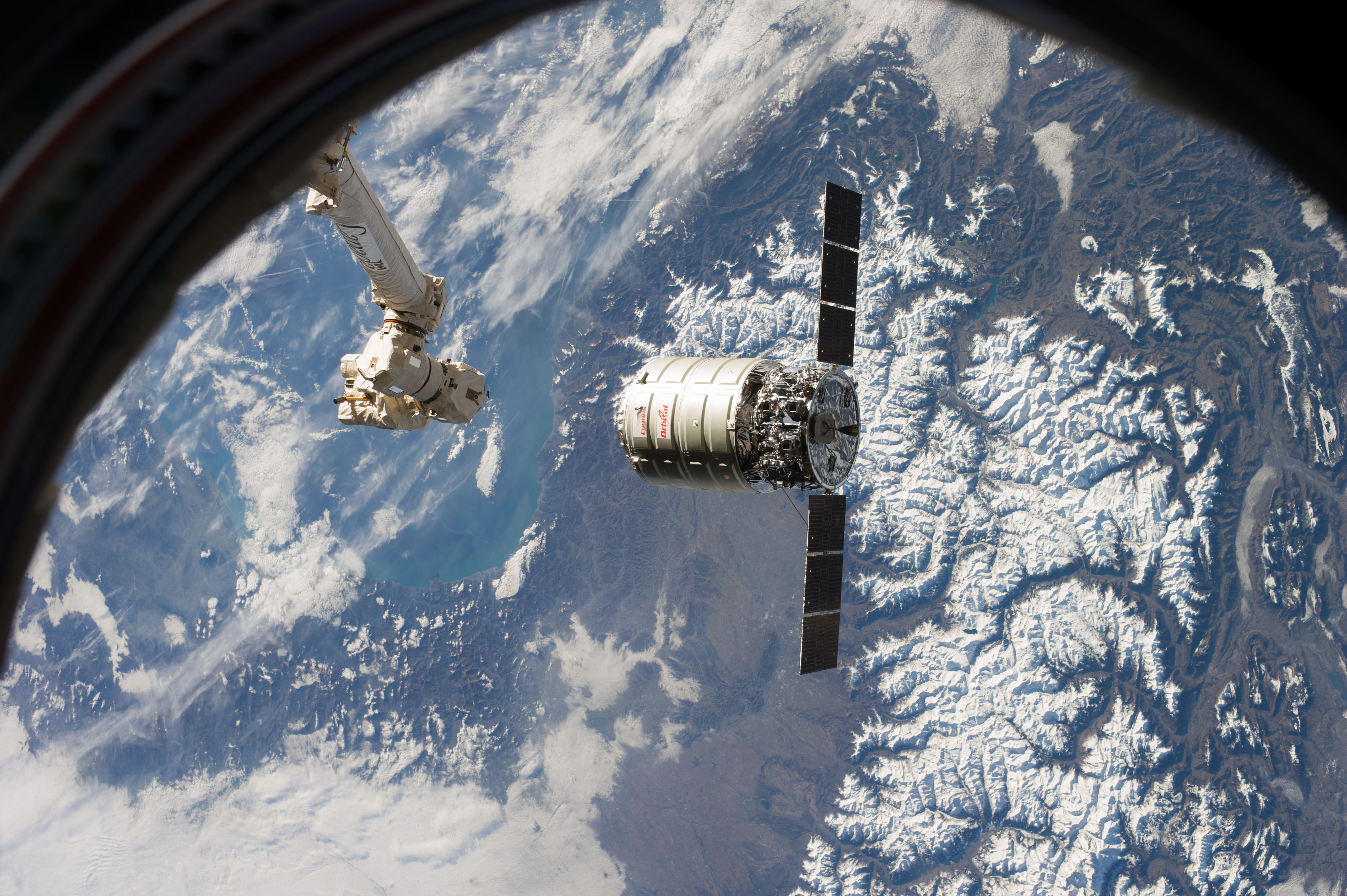 Canadarm2 Robitic Arm Moves Toward Cygnus