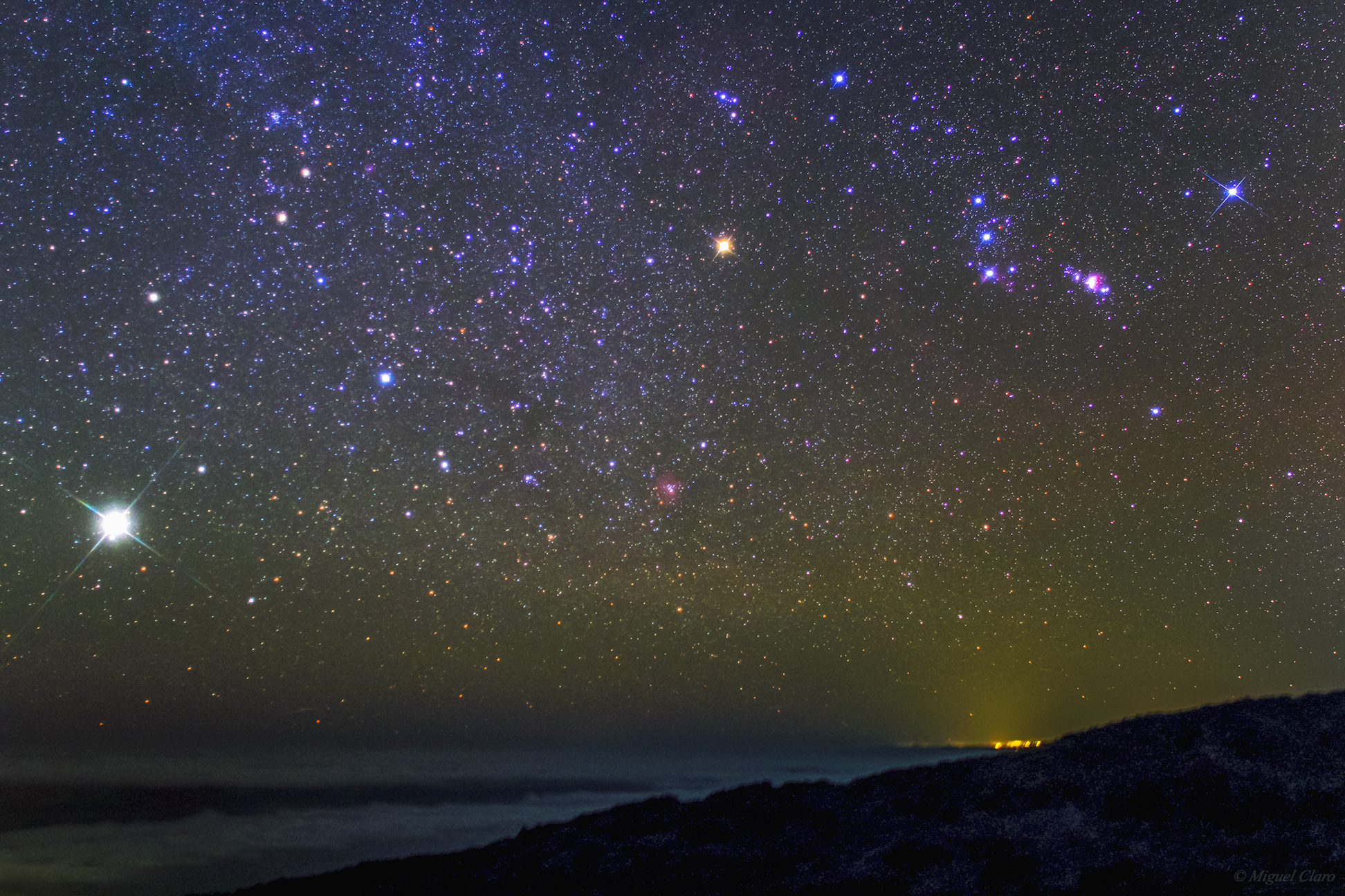 Jupiter and Orion Shine Over Canary Islands in Dazzling Night Sky Photo