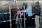 Lyn Glenn, daughter of John Glenn and the sponsor of the USNS John Glenn, christens the ship on Feb. 1, 2014 in San Diego, Calif.