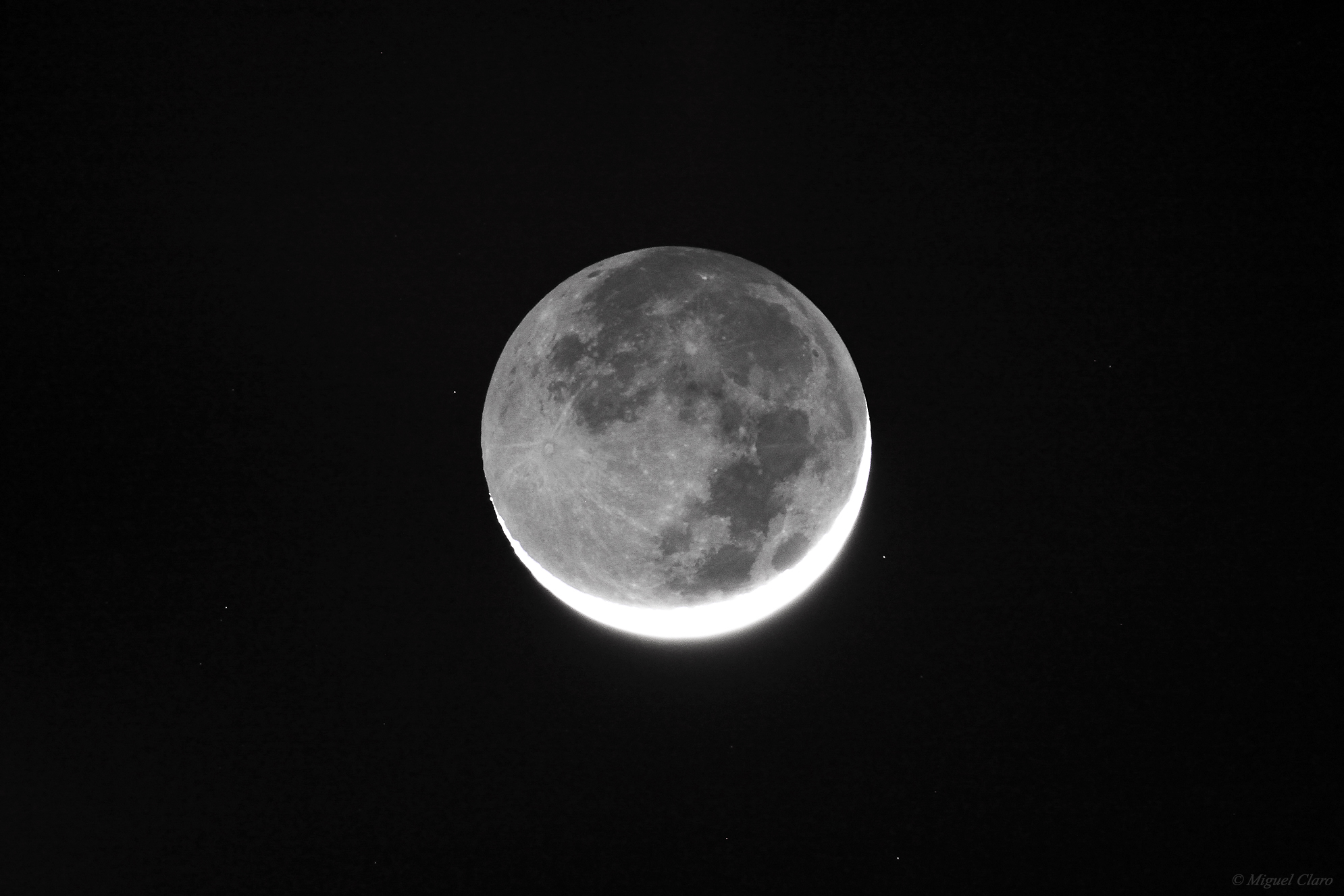 The Moon and Earthshine Over Portugal by Miguel Claro