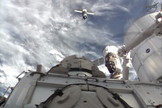 The Russian Progress 54 cargo ship approaches the International Space Station with the Earth in the background on Feb. 5, 2014.