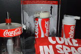 Coke in space: Coca-Cola in space memorabilia, including one of the original 1985 space Coke cans (center).
