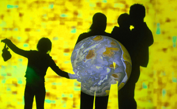 For the installation "The Hidden Light," Dan Goods used a projector and a spotlight to illustrate the difficulty of locating other planets.