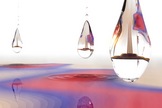 A Dropleton is a new kind of stable particle cluster in solids, formed inside a tiny correlation bubble (drops). This liquid-like particle droplet is created by light and its energy (horizontal direction) has quantized dependency on light intensity (vertical direction).