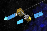 An artist's concept of a robotic unit transferring much-needed propellant to an orbiting satellite.
