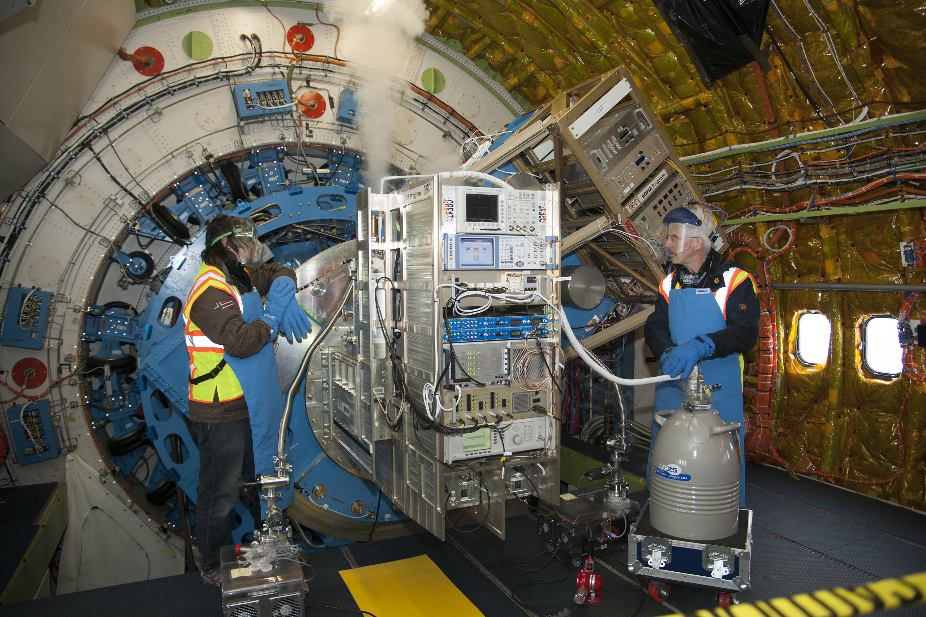 SOFIA: Cooling the GREAT Spectrometer
