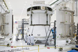 NASA engineers ready the Orion EFT-1 mock service module for installation of the fairings that will protect it during launch when Orion lifts off on its first mission, now slated for December 2014.