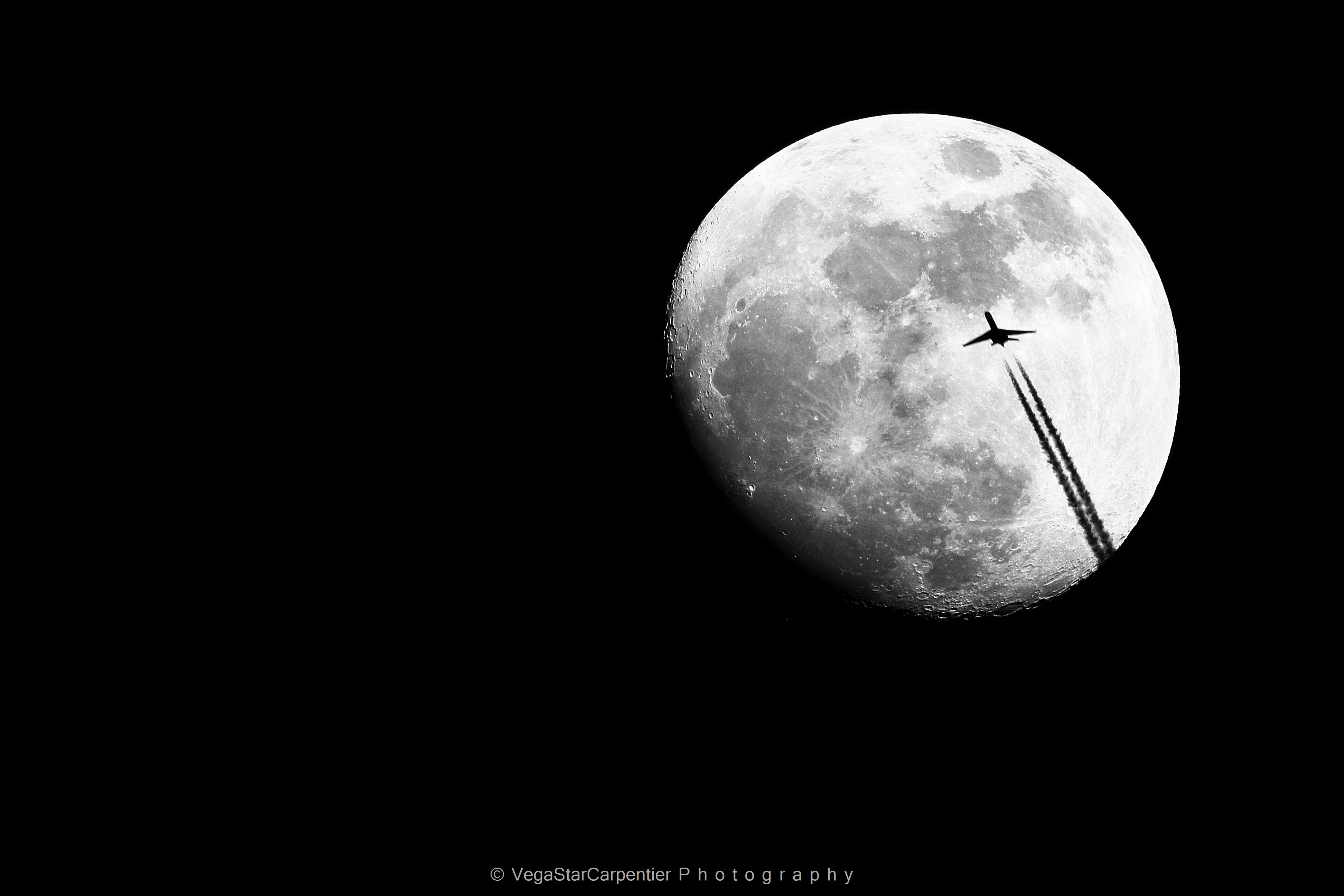 Airplane Cruises Across Moon by VegaStar Carpentier