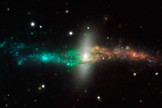 This color composite of the unusual polar ring galaxy NGC 4650A was created from data from the MUSE instrument on ESO's Very Large Telescope in Chile. The MUSE instrument, which went online in March 2014, splits the light from each part of the galaxy into component colors to show the chemical and physical properties of each point.