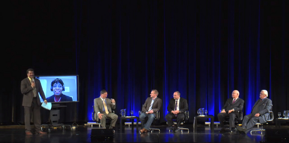 Astrophysicist Neil deGrasse Tyson (far left) hosts the 2014 Asimov Memorial Debate, focused on selling private spaceflight, on March 19, 2014 at the American Museum of Natural History in New York City, NY.