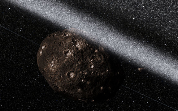 This artist’s impression shows the view from inside the ring system around the asteroid Chariklo (at center) with potential shepherding satellites also visible. The asteroid is the first non-planetary body in the solar system discovered to have its own ring system. Image released March 26, 2014.