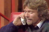 Sir Richard Branson speaks with the child Shihan Musafer by phone on BBC TV's "Going Live!" show in 1988. Branson credits Musafer for inspiring him to found Virgin Galactic and now, 25 years later, hopes to reconnect.