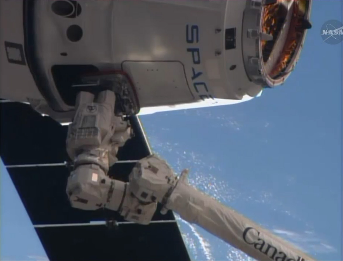 SpaceX Dragon Captured by Station Arm