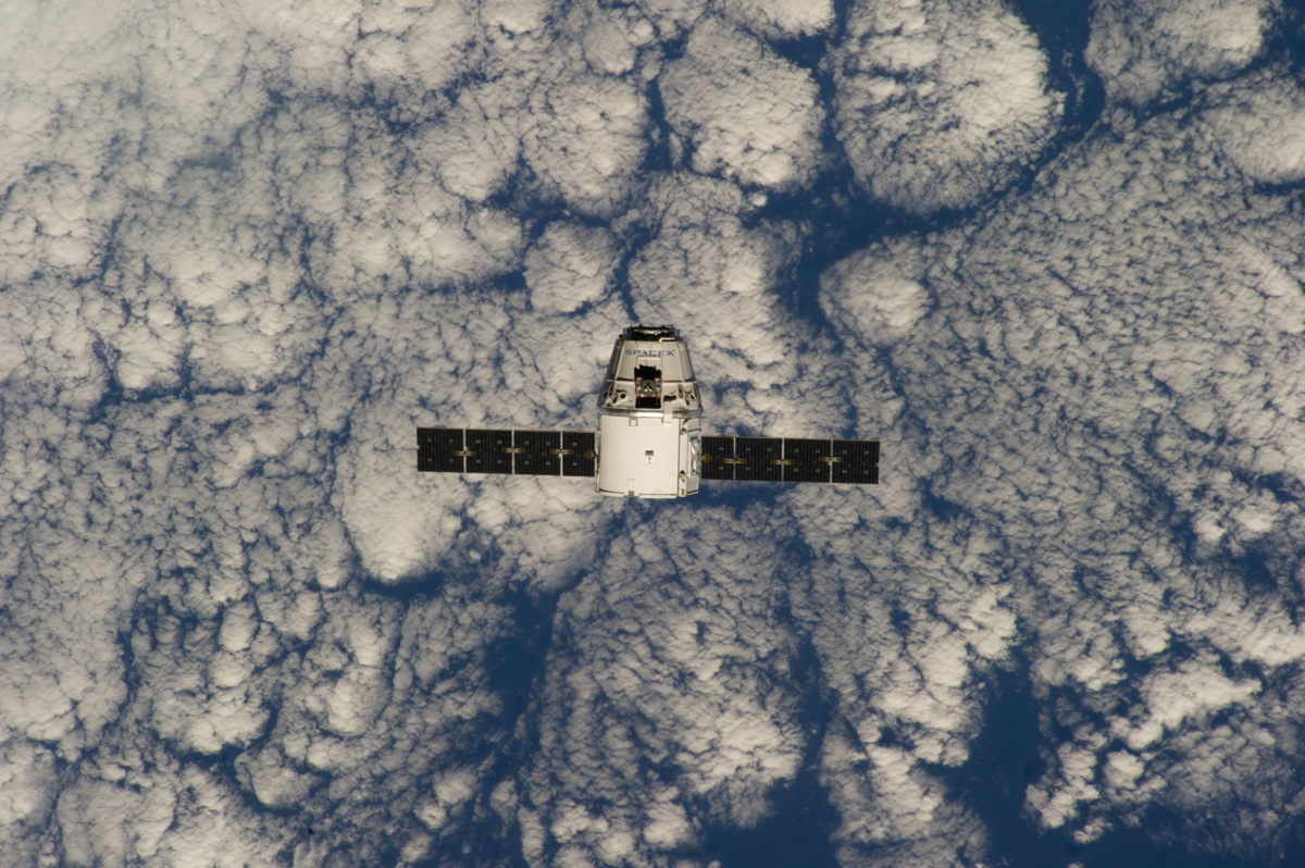 Dragon Capsule Above Clouds