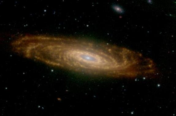 This Spitzer infrared image of galaxy NGC 7331 is dominated by glowing warm dust.