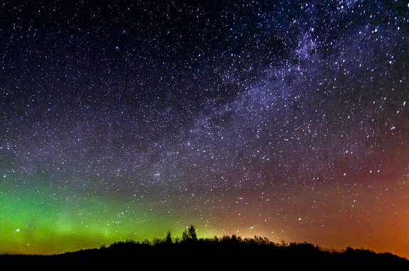 A small Camelopardalid meteor streaks through the northern lights as the Milky Way shines overhead in this stunning photo by stargazer Gail Lamm from Balmoral, Manitoba in Canada on May 24, 2014.