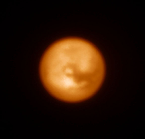 This infrared image of Saturn’s largest moon, Titan, was one of the first produced by the SPHERE instrument soon after it was installed on ESO's Very Large Telescope in Chile in May 2014.