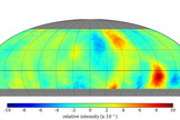 Mapping the sky with only one-third of its detectors, HAWC has already captured three regions of excessive energy, shown in red.