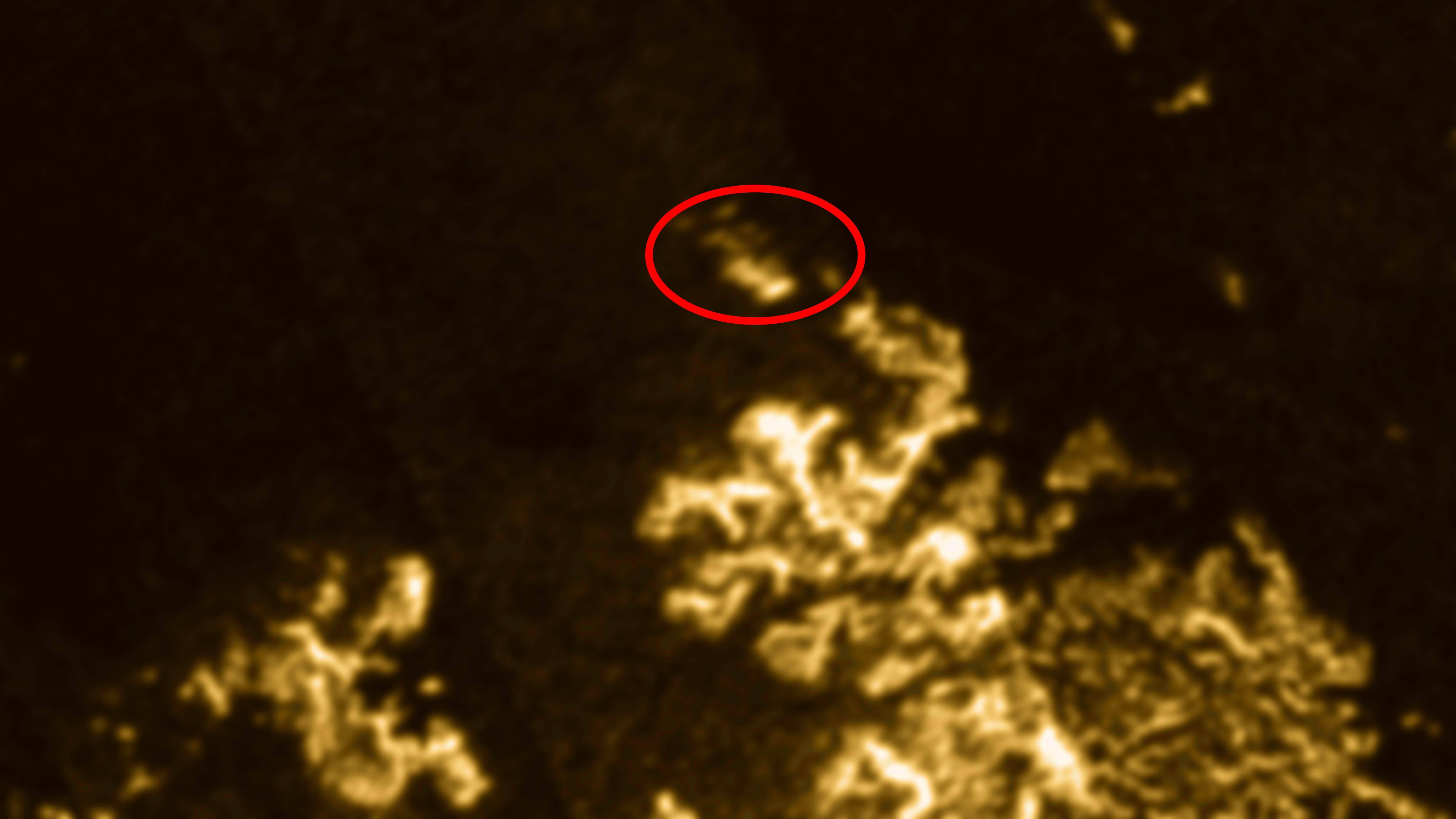 'Magic Island' Possibly Seen in Seas of Saturn's Huge Moon Titan