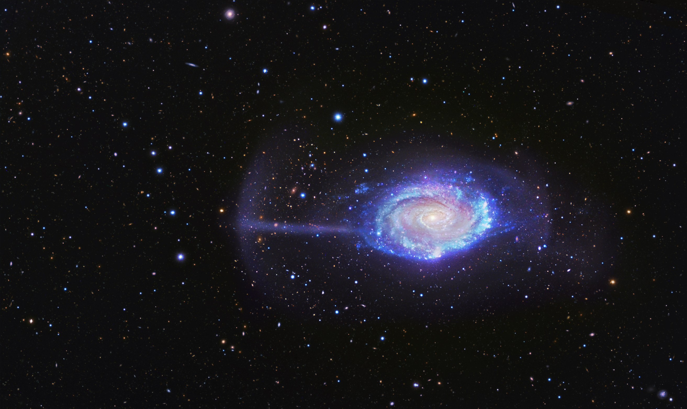 Cosmic Crumbs Reveal Umbrella Galaxy's Eating Habits