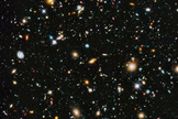 Where are they? It’s a big question and a big universe. Astronomers using NASA’s Hubble Space Telescope have assembled this Hubble Ultra Deep Field 2014 picture.