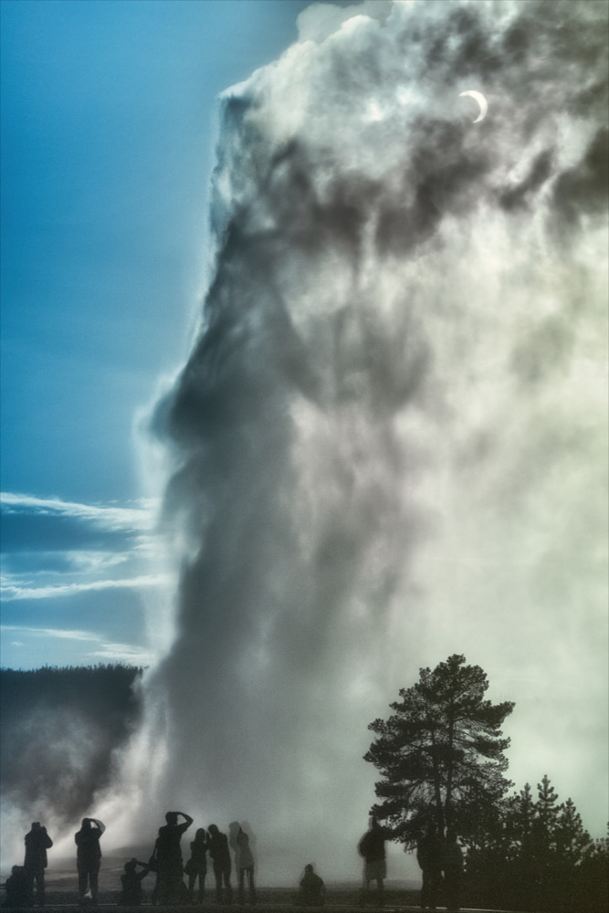 Eclipse and Old Faithful by Robert Howell
