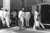 On July 16, 1969, astronauts Neil Armstrong, Buzz Aldrin and Michael Collins lifted off from Earth. Four days later, Armstrong and Aldrin became the first humans to walk on the moon. Here, the three suit up for a countdown demonstration test.