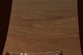 NASA's Mars Exploration Rover Opportunity shows a view of "Lunokhod Crater," lying south of Solander Point on the west rim of Endeavour Crater. This image was taken on April 24, 2014 and released on July 28.