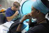 European Space Agency astronaut Thomas Pesquet (left) and NASA astronaut Jeanette Epps perform experiments during the NEEMO 18 mission in July 2014.