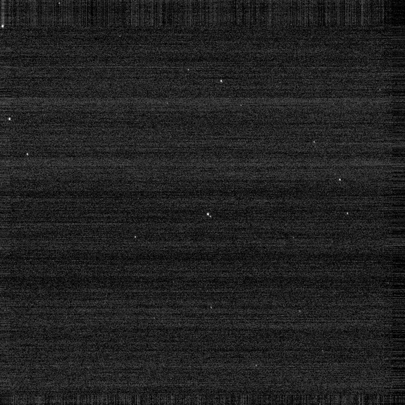 New Horizons spacecraft viewed dwarf planet Pluto and its large moon Charon (about 10,500 miles or 17,000 km. apart) with its LORRI camera, at a distance of over 249 million miles (400 million km.). Image released July 24, 2014.