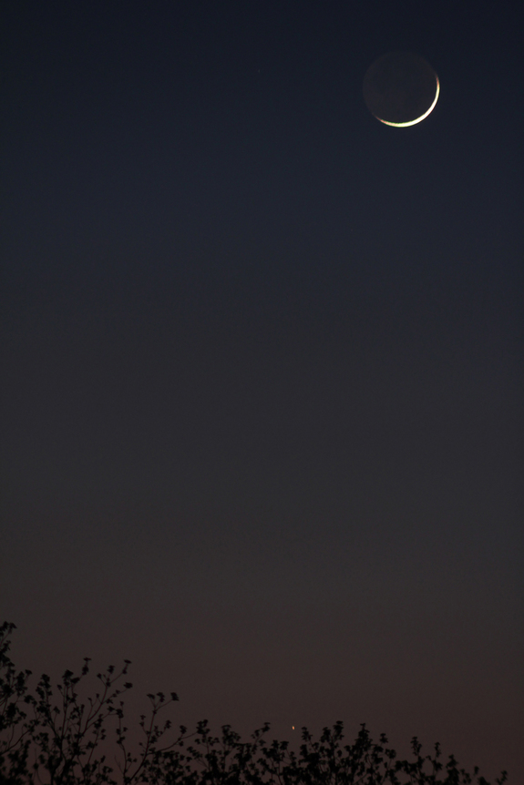 A 2-day-old moon and the bright star Aldebaran on May 11, 2013.
