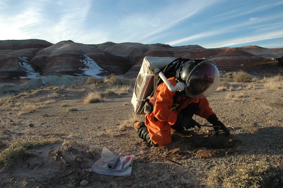 A mock Mars explorer digs into the surface of Earth, which serves as an analog for the Red Planet during an episode of "Man vs. the Universe."