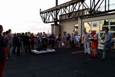 Final Frontier Design's Ted Southern and Nikolay Moiseev demonstrate their company's Spacesuit Experience, which allows customers to try on a pressurized spacesuit, during an invite-only event on a rooftop at the Brooklyn Navy Yard in Brooklyn, New York, on Aug. 28, 2014. NASTAR space training center director Brienna Henwood demonstrated the spacesuit during the event.