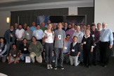 International Space Elevator Consortium (ISEC) participants, including Elevator Speech winners Lana and Campbell Gorlinski, holding their prizes — Amazon.com gift cards.
