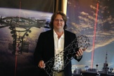 Strong man tactics! Bryan Laubscher, president of Odysseus Technologies, is deep in new materials research.