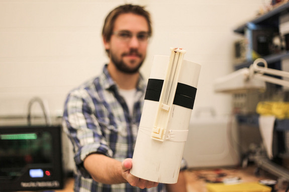 A key technology in MIT's skintight Biosuit spacesuit is the original active tourniquet design seen here. The technology combines shape memory alloys with 3D-printed structures (cream-colored plastic) and a white passive fabric to provide compression for astronauts.